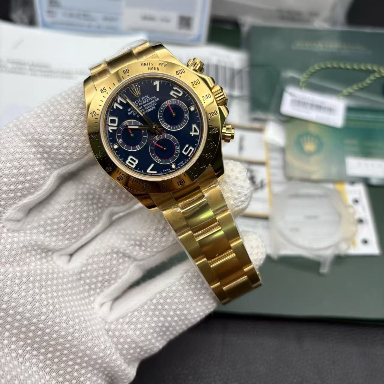 ba82d04918ea9560c653ffcccfaf078a Super Clone Rolex Daytona Gold with Blue Dial 116528 Replica - Image 7