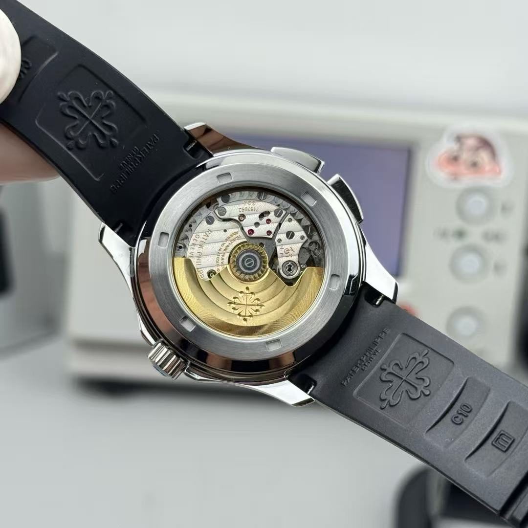 bbc87c27546a40795ffcab083a39f947 Replica Patek Philippe Aquanaut Travel Time Stainless Steel Watch 5164A-001 - Image 9