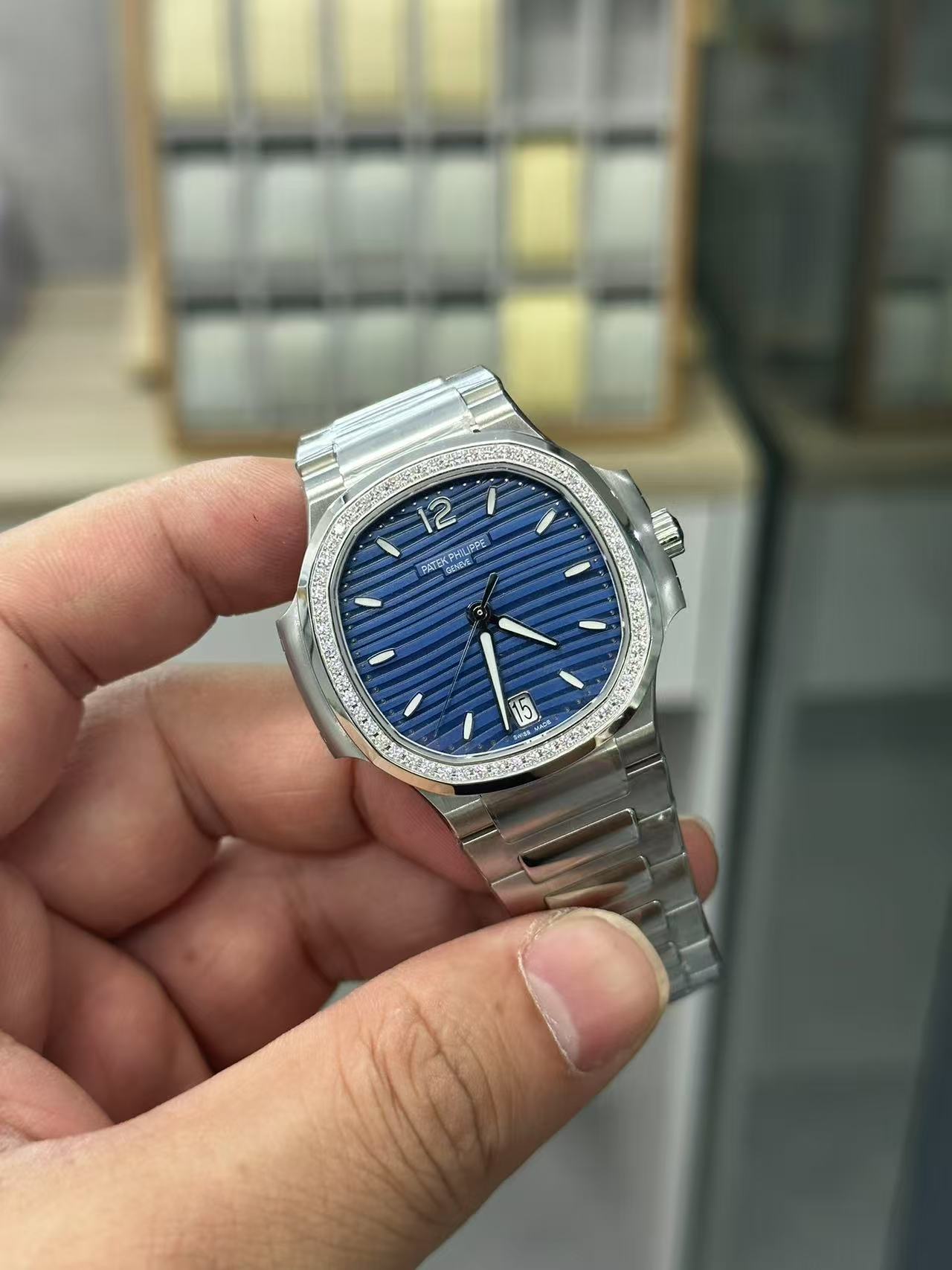 2055c7c8065d48ef1a554abfa9f0ffd9 Swiss made Replica Patek Philippe Nautilus 7018 - Image 6