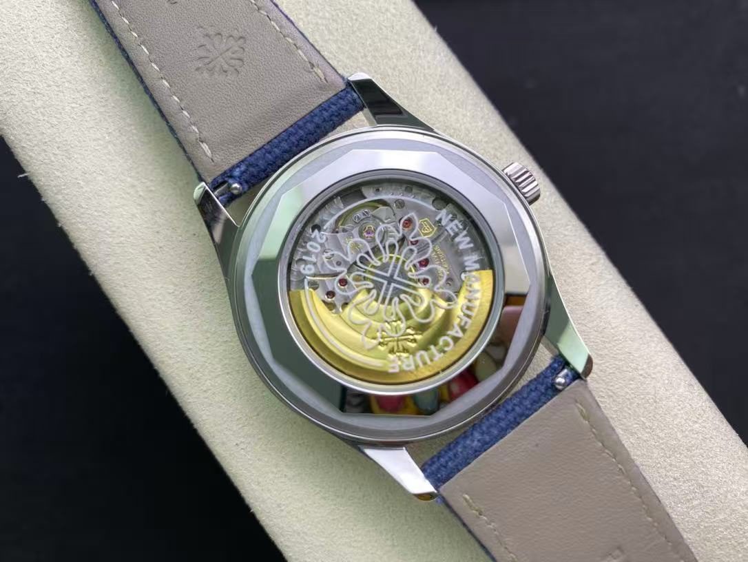 7319c0a53b6c8ca0fb3eeda156b79e54 Replica Patek Philippe 6007A Blue Dial Watch - Image 7