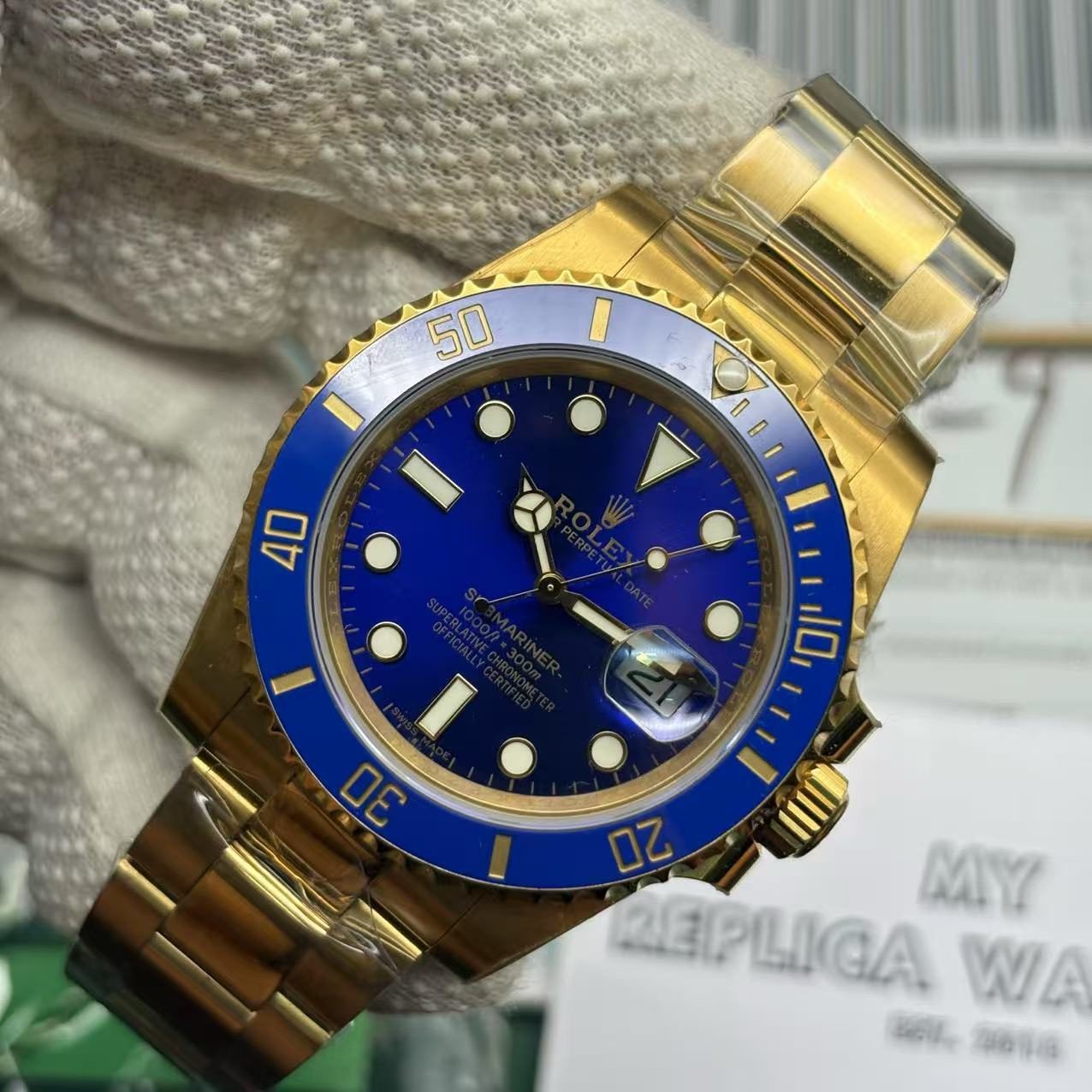 e84cfd95a9bcc5e1425fd3db9722fba5-2 Rolex Submariner Full Gold Blue Dial Swiss Clone Replica - Image 5