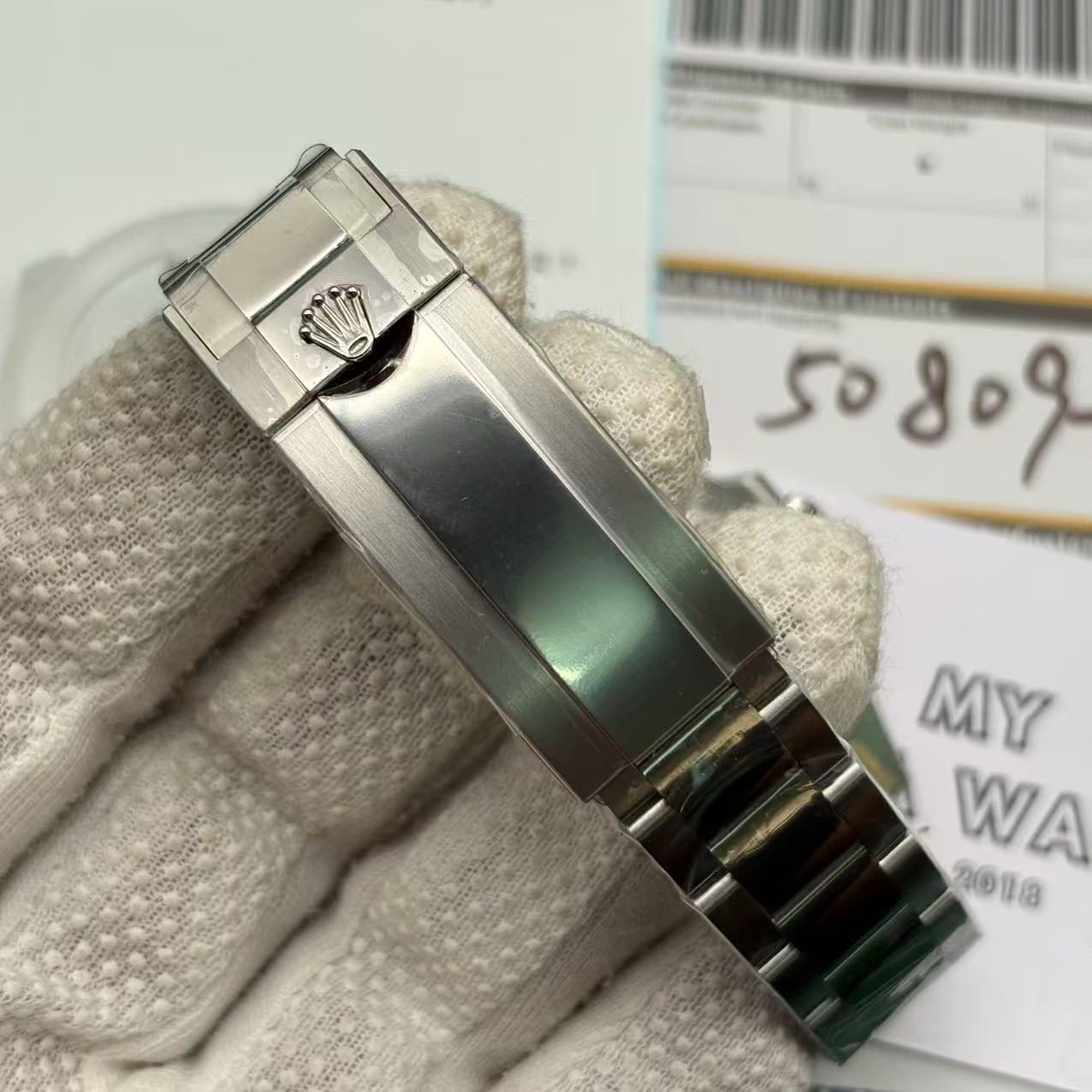 e95ccb73f43336f46dfb755ba010248a Rolex Submariner Blue Dial Swiss Clone Replica - Image 7