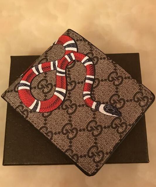 replica-11-clone-gucci-snake-leather-wallet '-watches 1